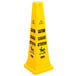 A yellow Rubbermaid cone-shaped wet floor sign with black "Caution" text.