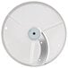 A circular white Robot Coupe 5/32" slicing disc with a hole in the center.