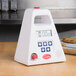 A white Cooper-Atkins digital kitchen timer on a counter.