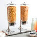 A Choice double canister cereal dispenser filled with cereal and fruit.