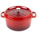 A red GET Heiss round Dutch oven with a lid.