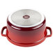 A red and white Heiss cast aluminum Dutch oven with a lid.