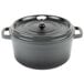 A gray enamel coated cast aluminum round Dutch oven with a lid.