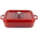 A red square roasting pan with a lid.