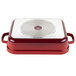 A red and white rectangular roasting pan with a lid.