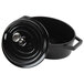 A black enamel coated cast aluminum oval pot with a lid.