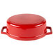 A red and white enamel coated cast aluminum oval pot with a lid.