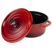 A red GET Heiss cast aluminum Dutch oven with a black lid and handle.