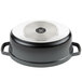 A black and silver GET Heiss cast aluminum oval dutch oven with a round metal lid.
