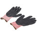 A pair of black and red Cordova Machinist Cut Resistant Gloves with black foam nitrile palms.