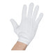 A hand wearing a white Henry Segal waiter's glove with snap-close wrists.