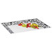A GET Soho melamine tray with sliced and whole bell peppers on it.