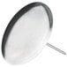 A stainless steel flat round disc with a metal handle.