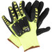 A pair of Cordova OGRE-Impact work gloves with yellow and black fabric and black sandy nitrile palm coating.