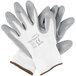 A pair of grey and white gloves with a gray nitrile palm coating.
