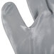 A close up of a white Cordova warehouse glove with a gray nitrile palm.