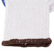 A white and blue knitted glove with brown trim on the wrist.