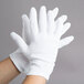A pair of Cordova Men's white inspection gloves.