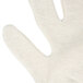 A close-up of a white Cordova jersey glove.