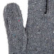 A close up of a Cordova gray jersey glove with a button on the thumb.