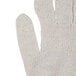 A close up of a large Cordova medium weight natural cotton jersey glove with a thumb.