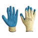 A pair of large yellow Cordova Kevlar gloves with blue latex palms.