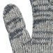 A close up of a Cordova knitted work glove in gray and white.