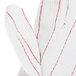 A pair of white Cordova work gloves with red stitching.