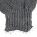 A close up of a gray Cordova knit glove with white trim.