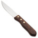 A Walco steak knife with a wooden handle.