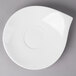 A white Villeroy & Boch porcelain saucer with a small hole in the middle.
