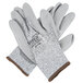 A pair of Cordova Valor gray gloves with white trim.