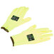 A pair of Cordova yellow cut resistant gloves with yellow polyurethane palms and black markings.
