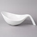 A Villeroy & Boch white porcelain bowl with a curved handle.