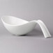 A white Villeroy & Boch porcelain bowl with a curved handle.