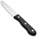 A Walco stainless steel steak knife with a black Delrin handle.
