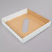 A white rectangular Lavex cardboard lid with a hole in the middle.