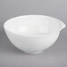 A white Villeroy & Boch porcelain salad bowl with a handle.
