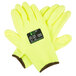 A pair of Cordova medium-sized heavy duty yellow cut resistant gloves with yellow and black palm coating.