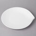 A white Villeroy & Boch porcelain plate with a leaf shaped design.