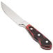 A Walco stainless steel steak knife with a jumbo red Delrin handle.