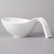 A white Villeroy & Boch porcelain bowl with a curved handle.