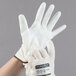 A pair of Cordova Monarch white engineered fiber cut resistant gloves with white polyurethane palm coating.