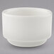 A white Villeroy & Boch porcelain dip bowl with a white rim on a gray surface.