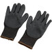 A pair of black Cordova Monarch work gloves with black latex palms.