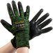A pair of Cordova Monarch green and black work gloves with black palm coating.