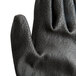 A pair of Cordova Monarch black engineered fiber gloves with black polyurethane palm coating.