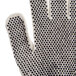 A close-up of a Cordova medium weight work glove with black PVC dots.