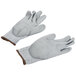 A pair of Cordova gray gloves with white trim on a white background.