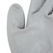 A close up of a Cordova Valor warehouse glove with a gray polyurethane palm.